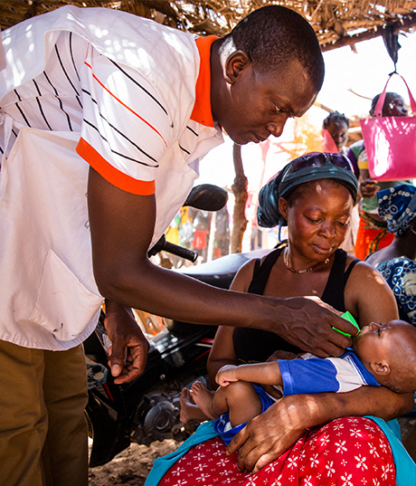 African child being given medicine